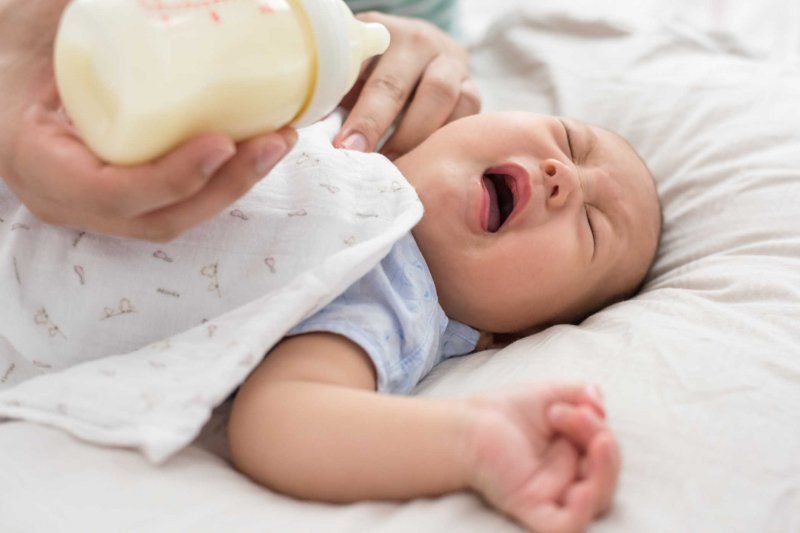 Why Do Babies Spit Up? What's Normal and When to Ask for Help