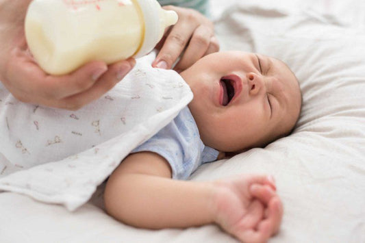 Why Do Babies Spit Up? What's Normal and When to Ask for Help